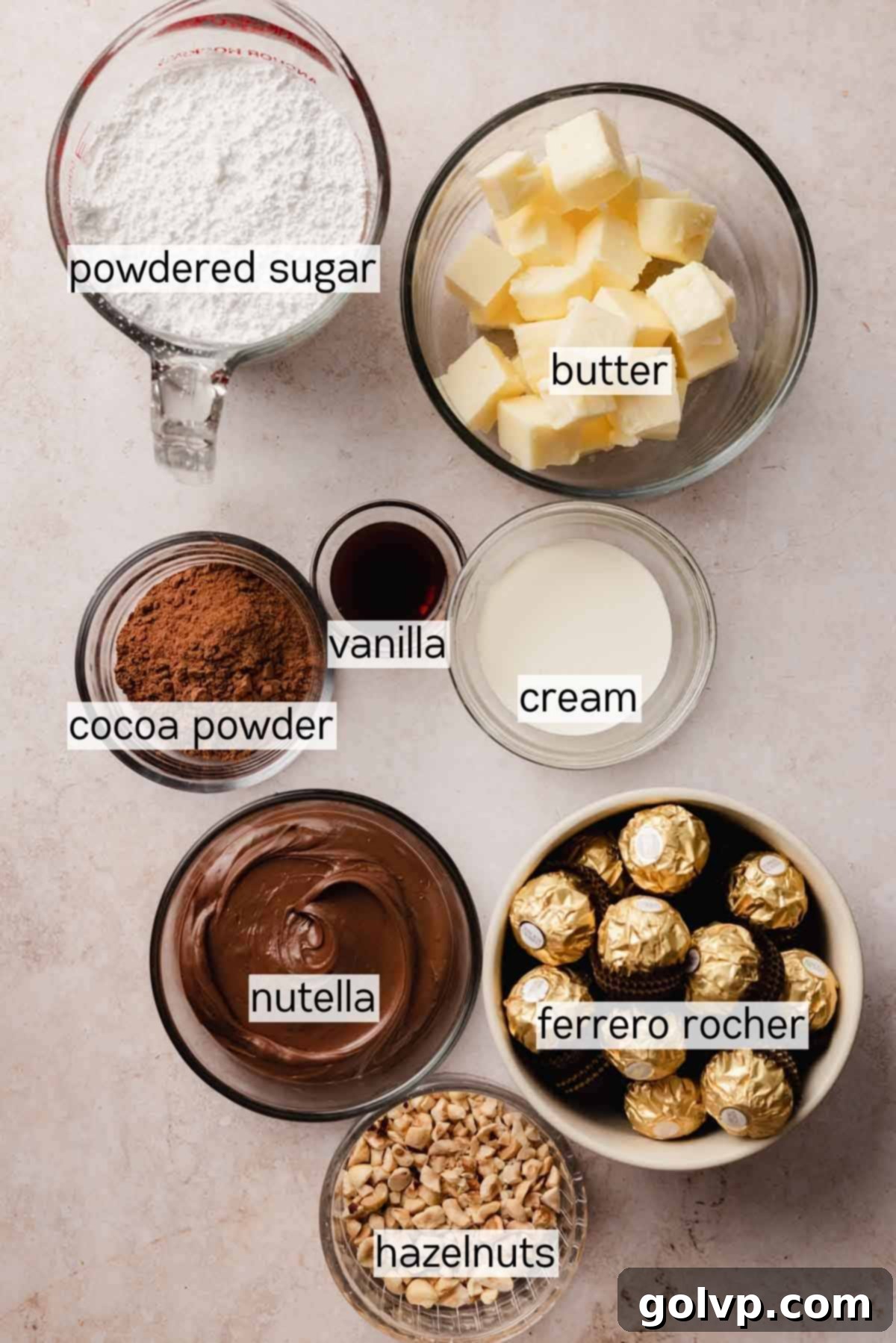 ingredients for creamy ferrero rocher nutella frosting in bowls