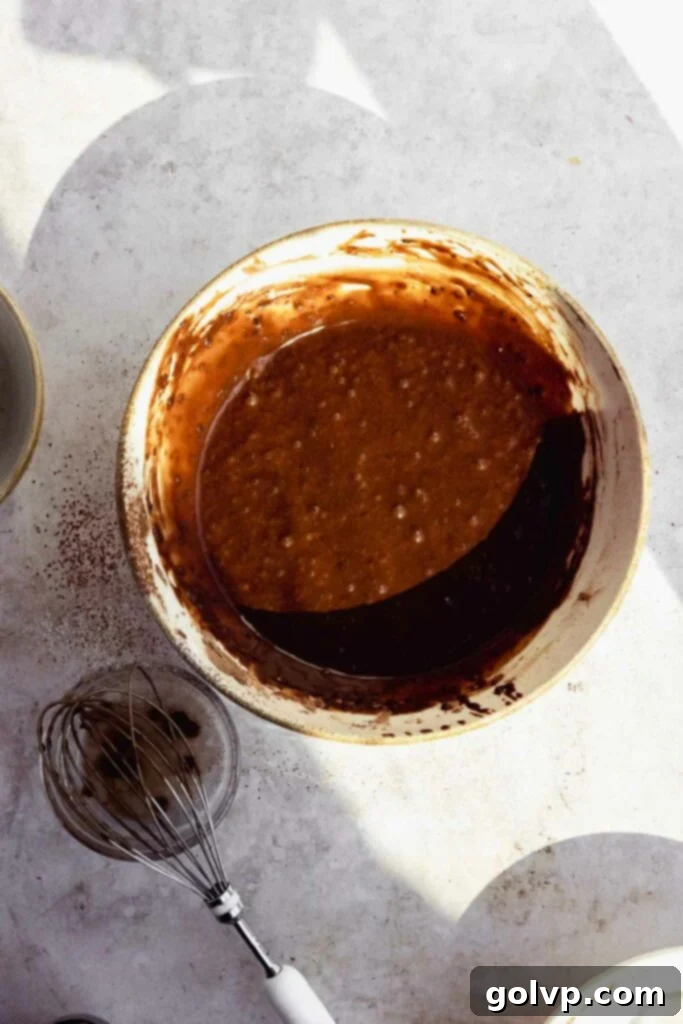 prepared chocolate cupcake batter in a mixing bowl