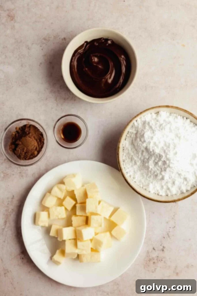 Nutella buttercream ingredients, including butter, powdered sugar, and cocoa