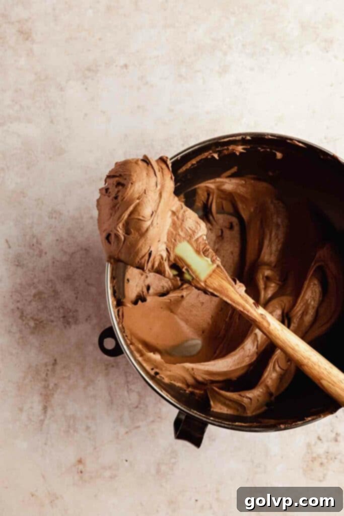 Prepared Nutella buttercream frosting in a bowl, smooth and creamy