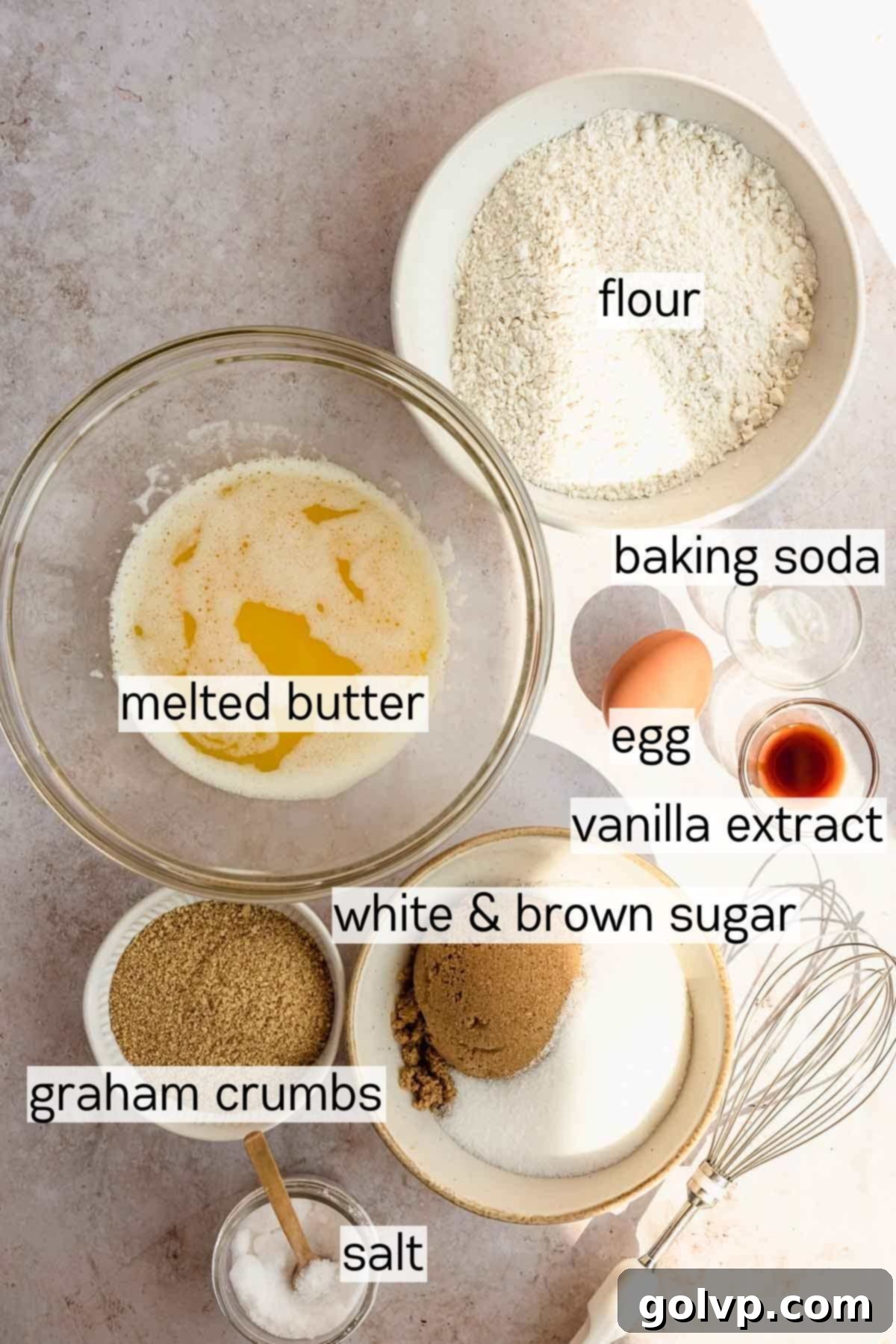 Decadent Pumpkin Cheesecake Cookies 3 flour, melted butter, baking soda, egg, vanilla extract, white and brown sugar, graham crumbs, and salt in bowls