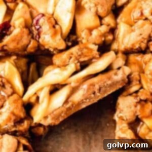 closeup of apple pie bars on parchment paper square