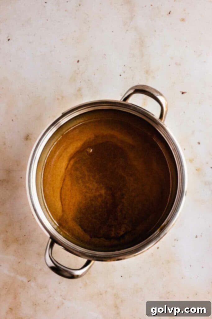 Freshly prepared butterscotch sauce cooling in a bowl