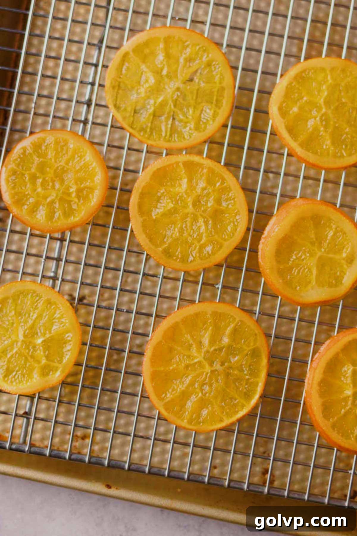 candied orange slices on cooling rack