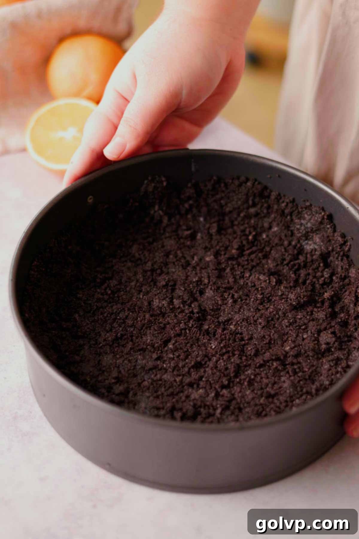 chocolate crust pressed into round baking pan