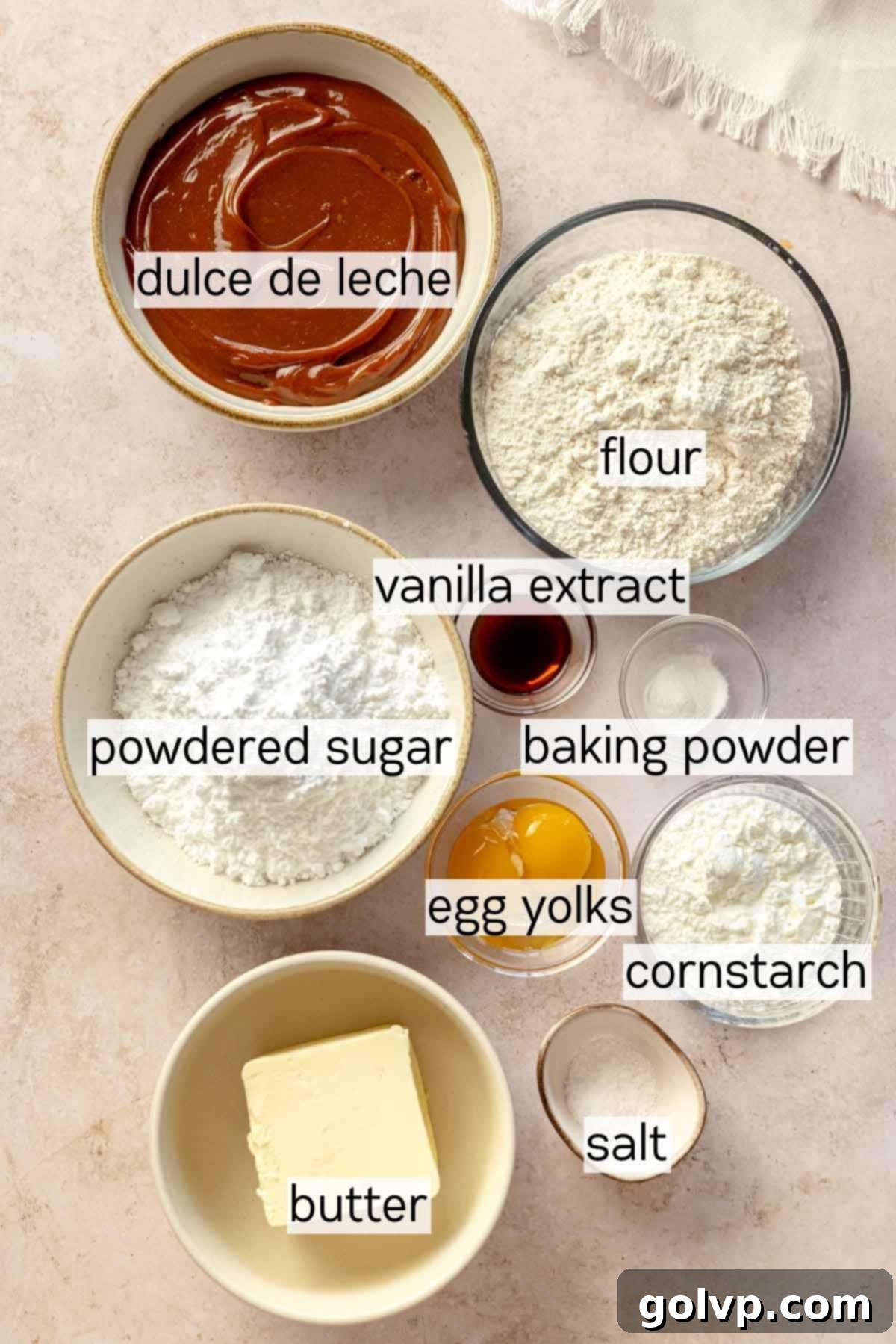 ingredients for dulce de leche cookies in bowls