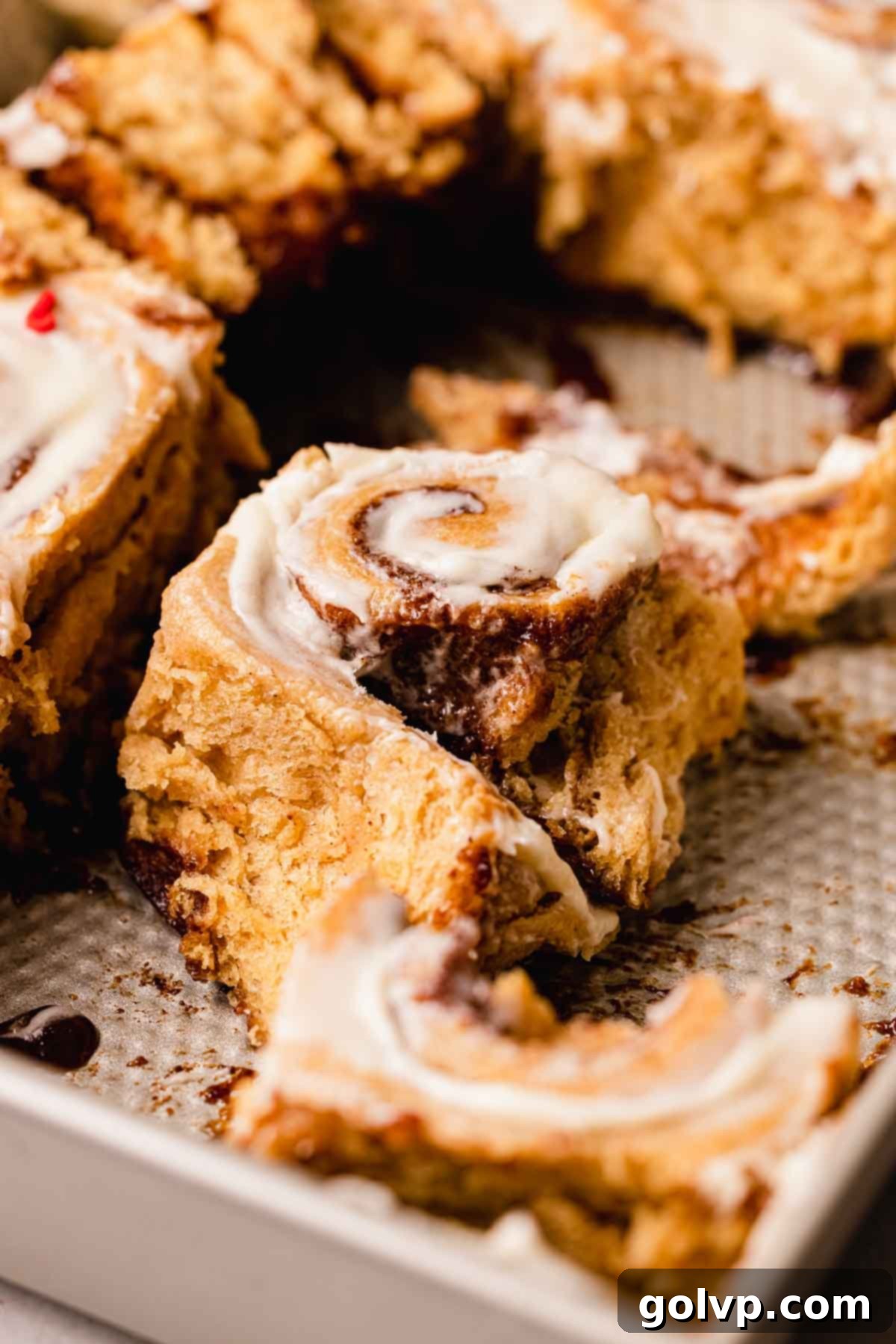 torn apart gingerbread cinnamon roll with gooey filling