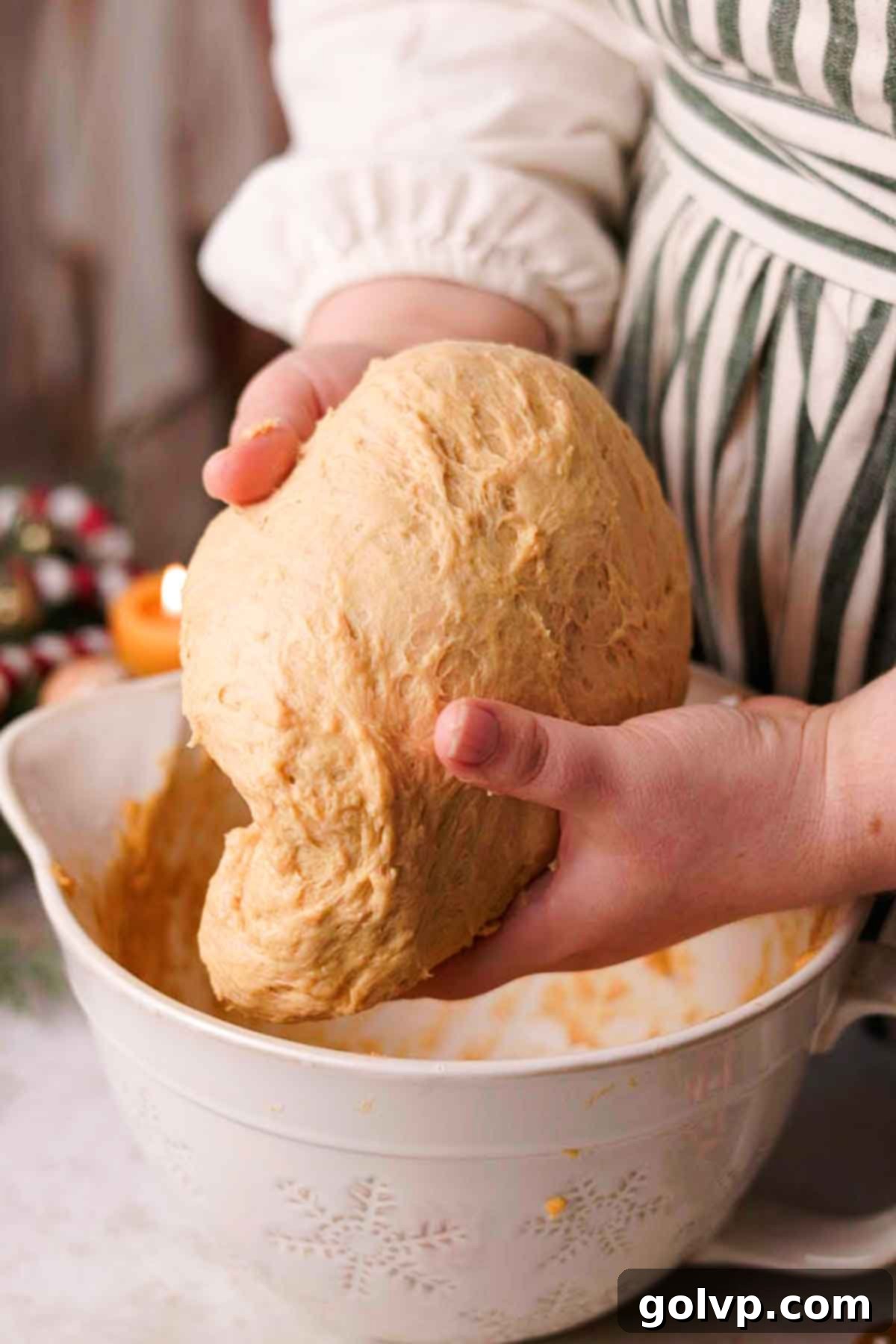 folding risen gingerbread cinnamon roll dough
