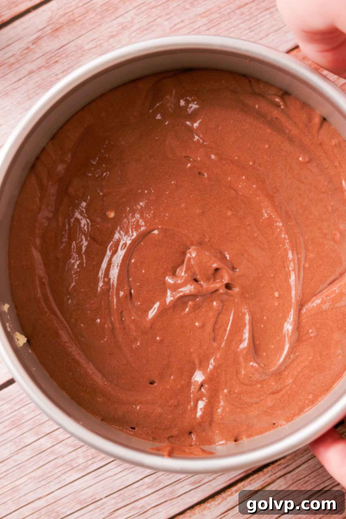 Raw chocolate batter in baking pan.
