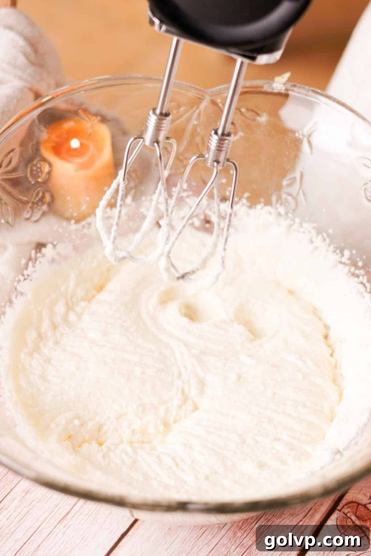 Beating softened butter, vegetable oil, granulated sugar, and salt with an electric mixer until the mixture is light and fluffy.