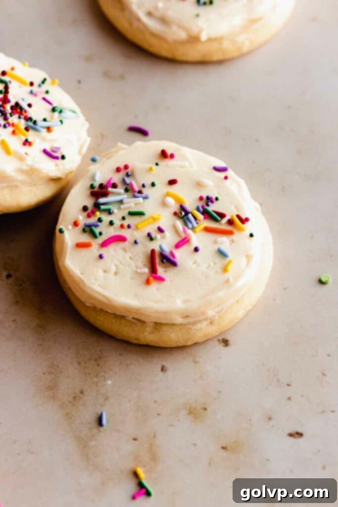 Classic Buttercream Sugar Cookies 2 Delicious vanilla buttercream frosted sugar cookies with sprinkles