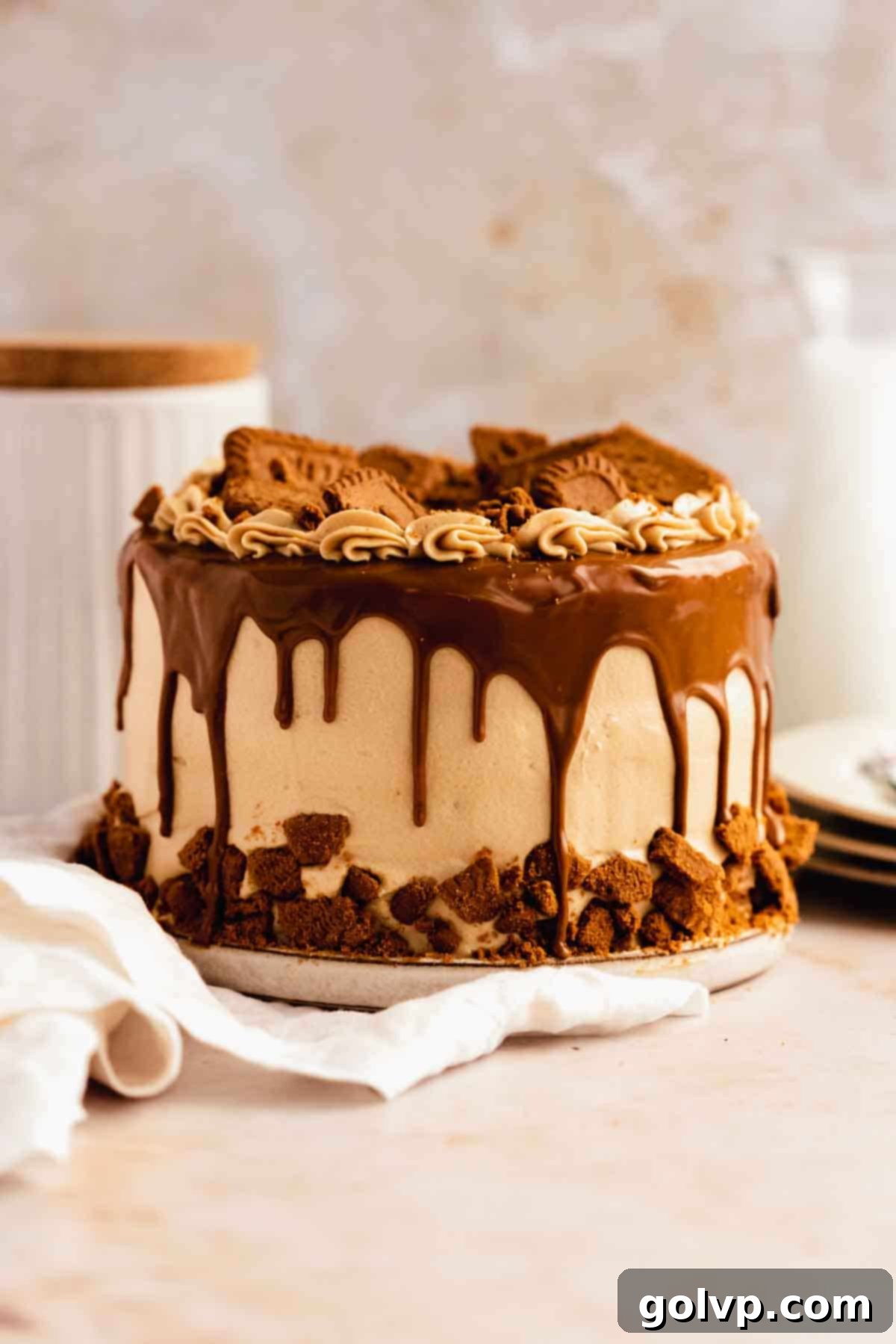 Biscoff cake with biscoff butter drip and crumbled cookies