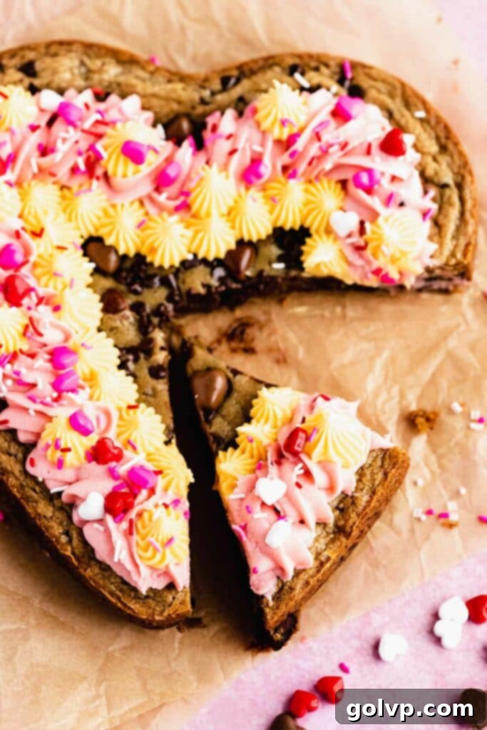 slicing giant heart cookie