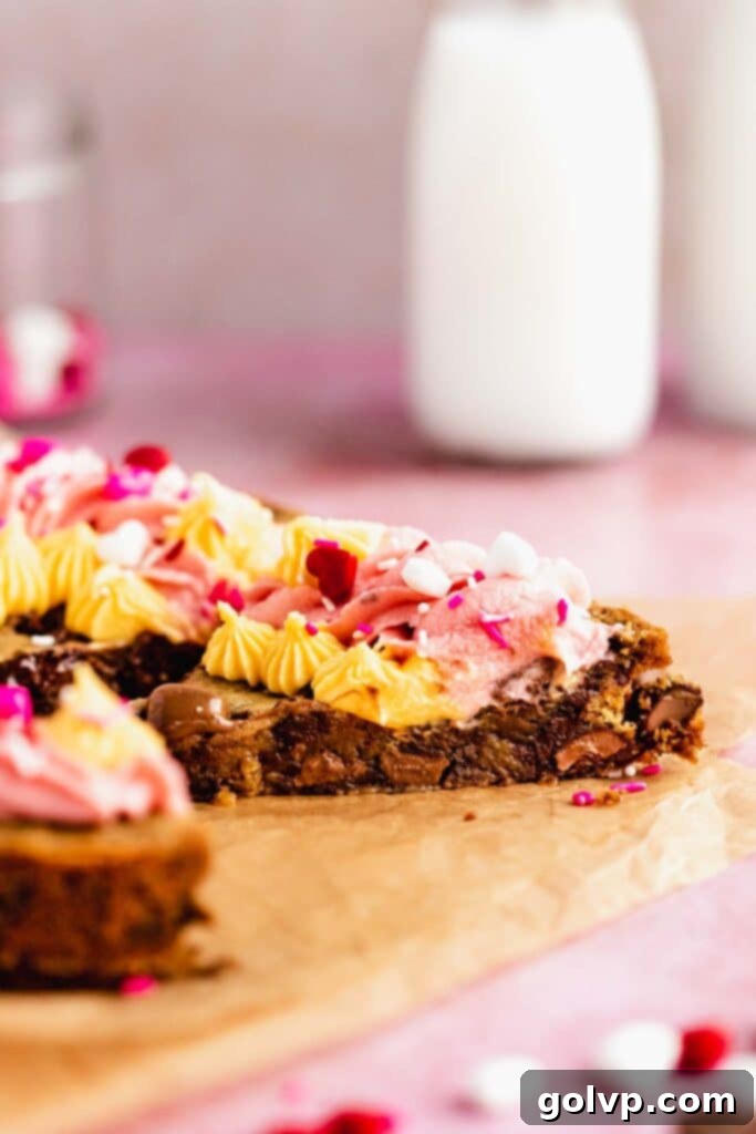 Slice of giant heart shaped cookie cake