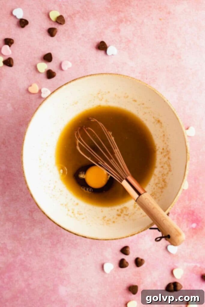 Add egg to butter and sugar for the cookie dough