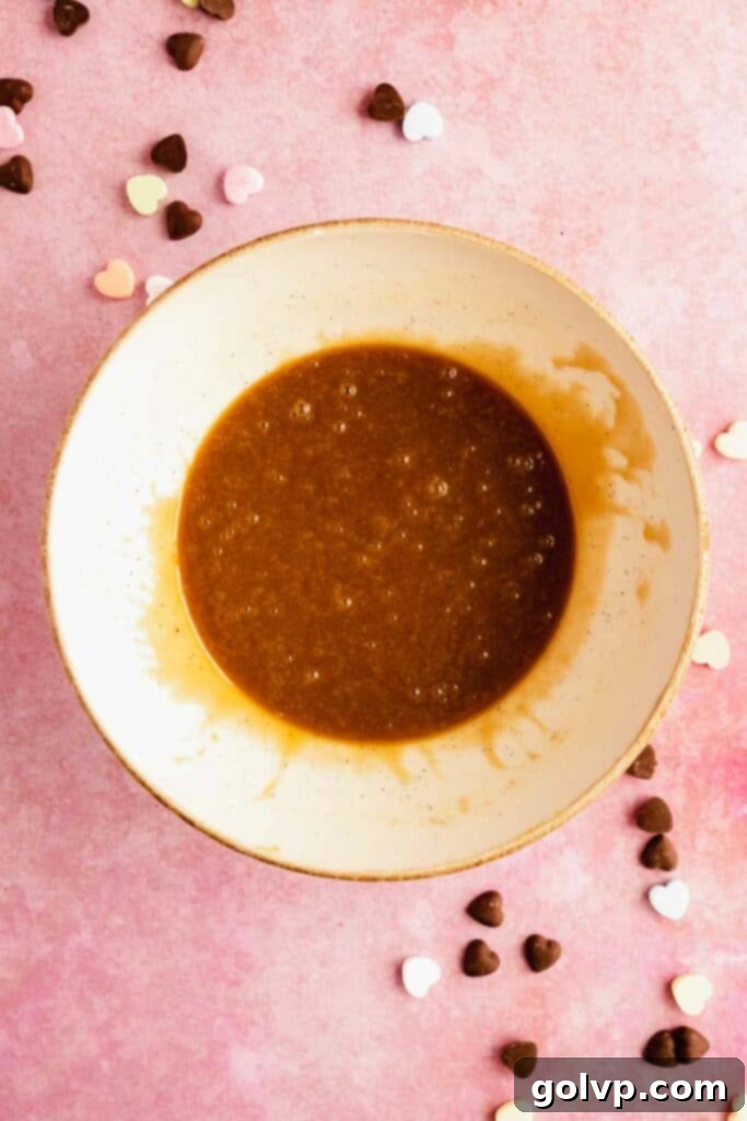 Wet ingredients for giant heart shaped cookie