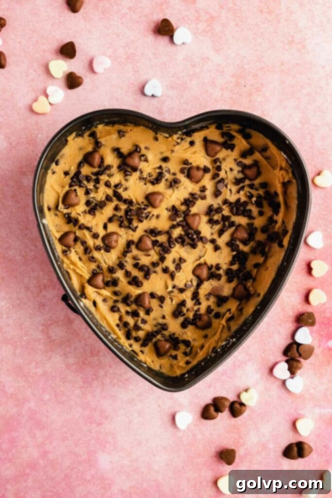 Cookie dough in heart shaped cake pan