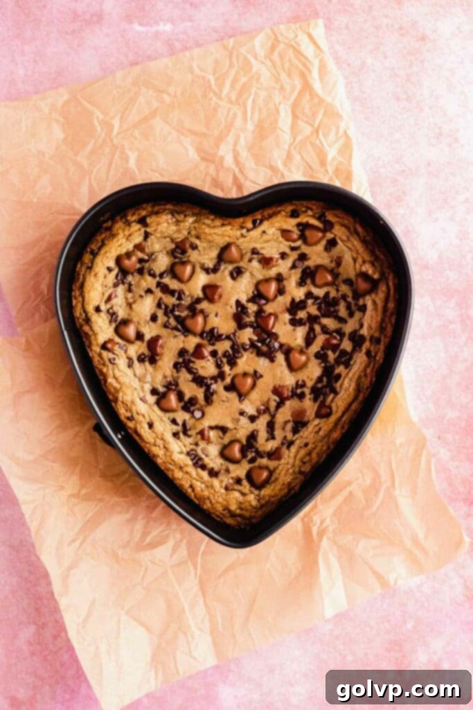Baked chocolate chip heart cookie