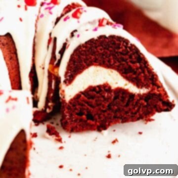 Closeup of red velvet bundt cake with cream cheese swirl and glaze, a perfect dessert
