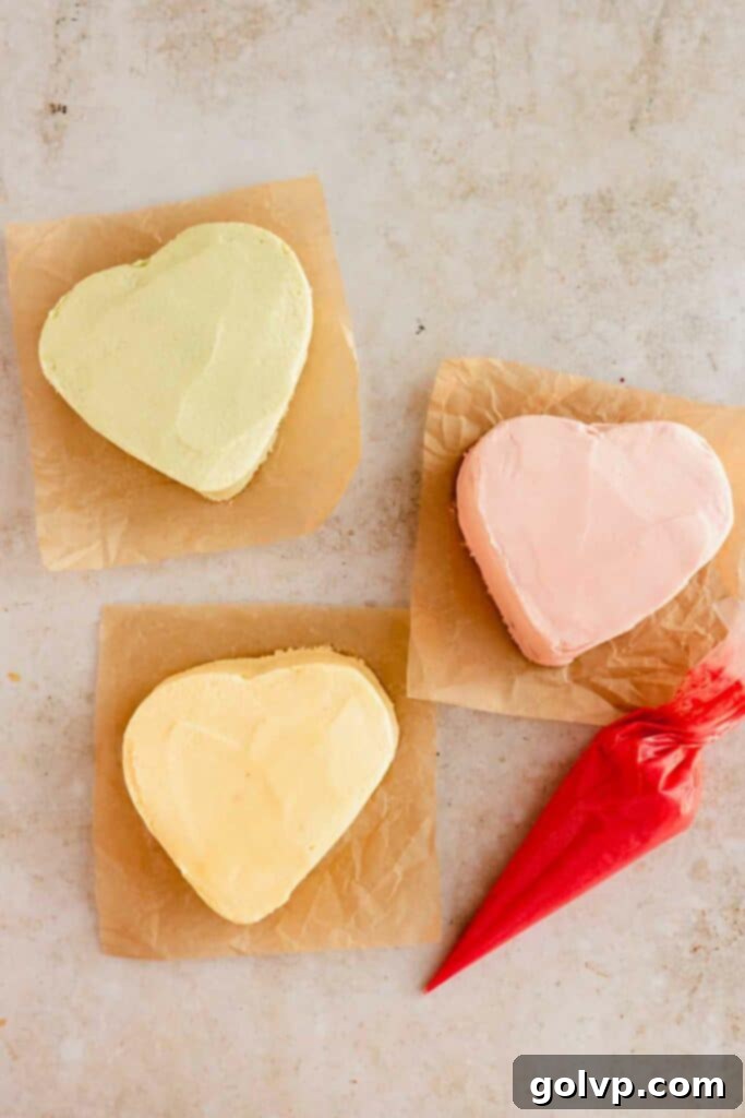 pink, green, and pink pastel frosted mini heart cakes