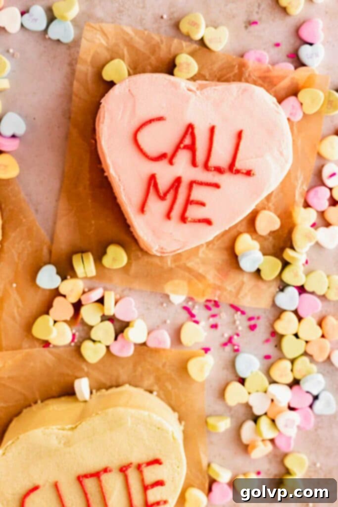 pink heart cake with call me written on top