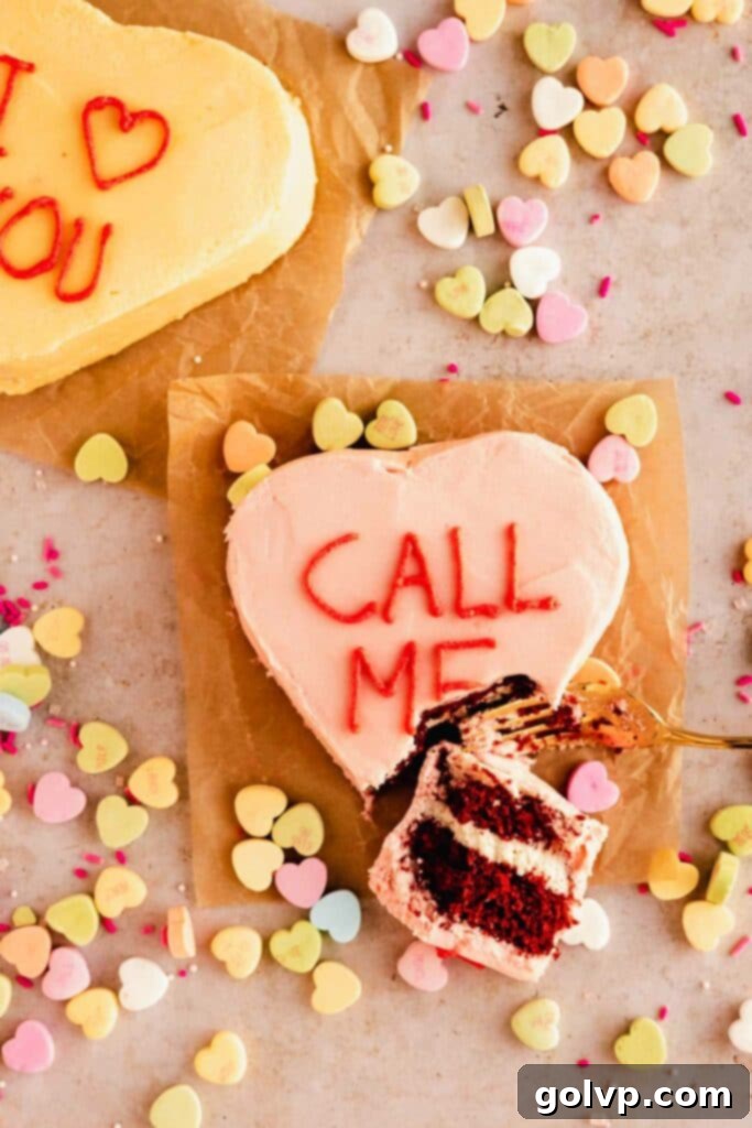 conversation heart cake with bite taken out