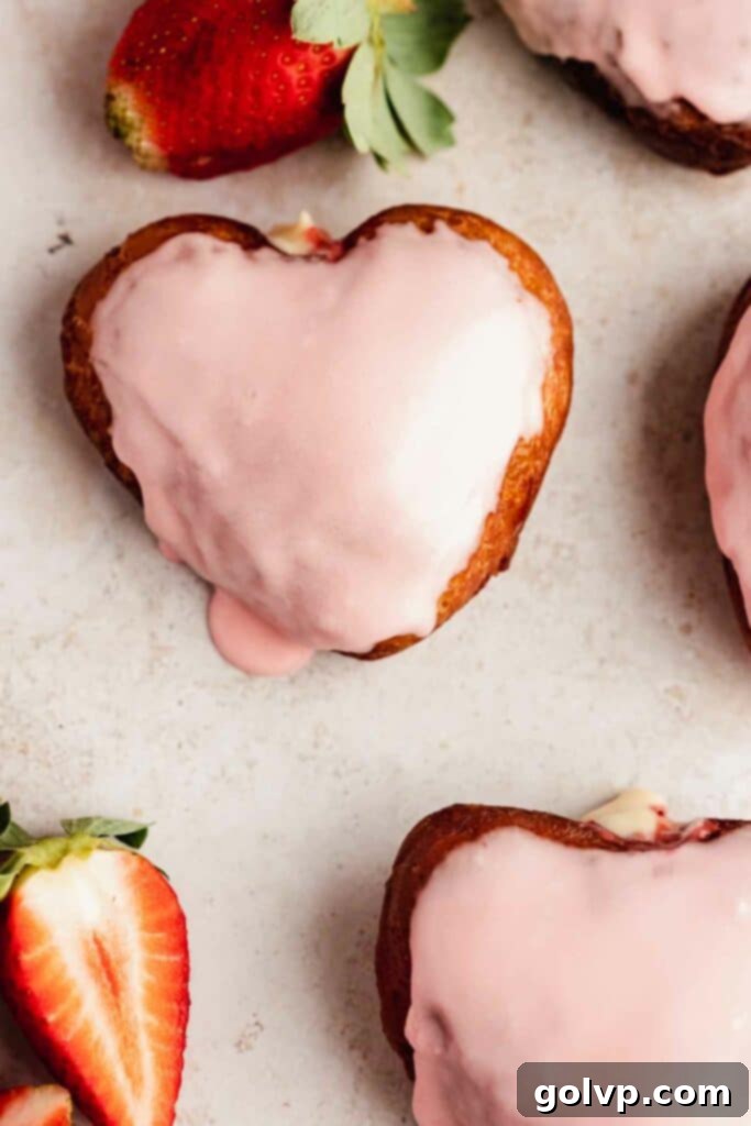 heart shaped donut with fresh strawberries