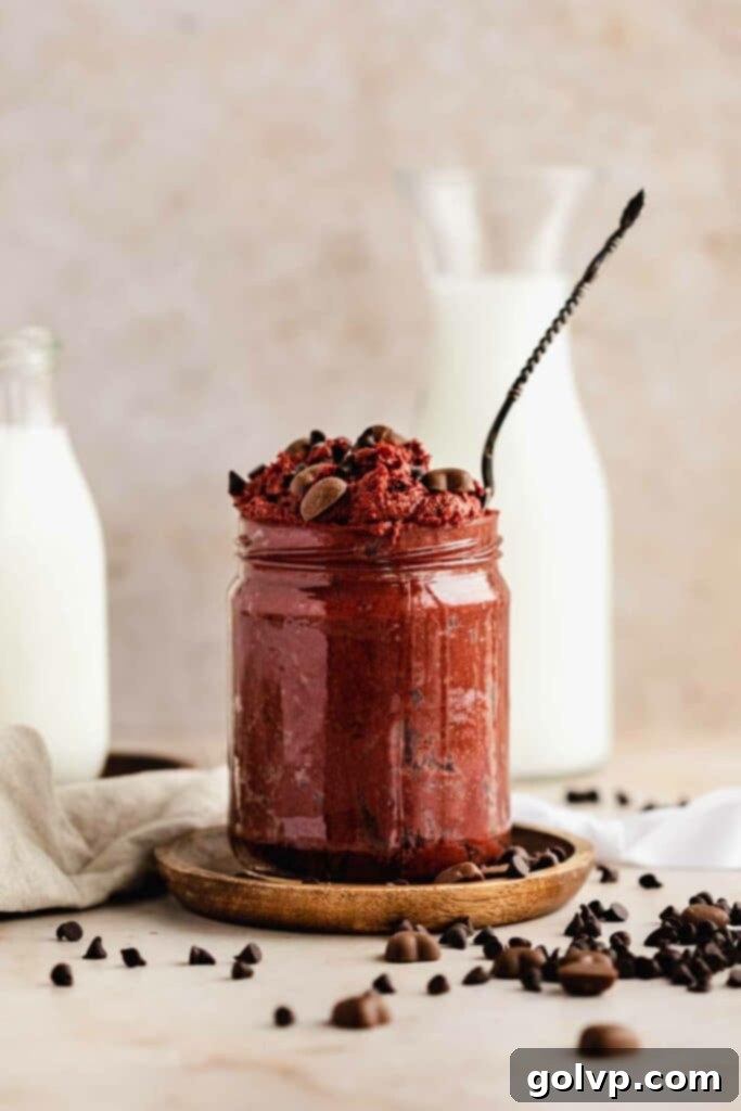 jar with spoon and red velvet cookie dough