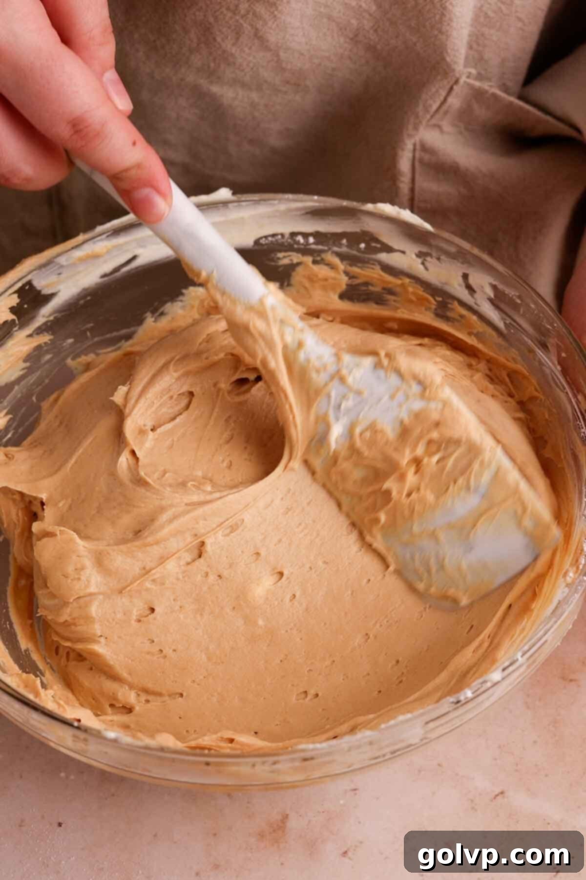 The creamy cheesecake filling after Biscoff cookie butter has been incorporated.