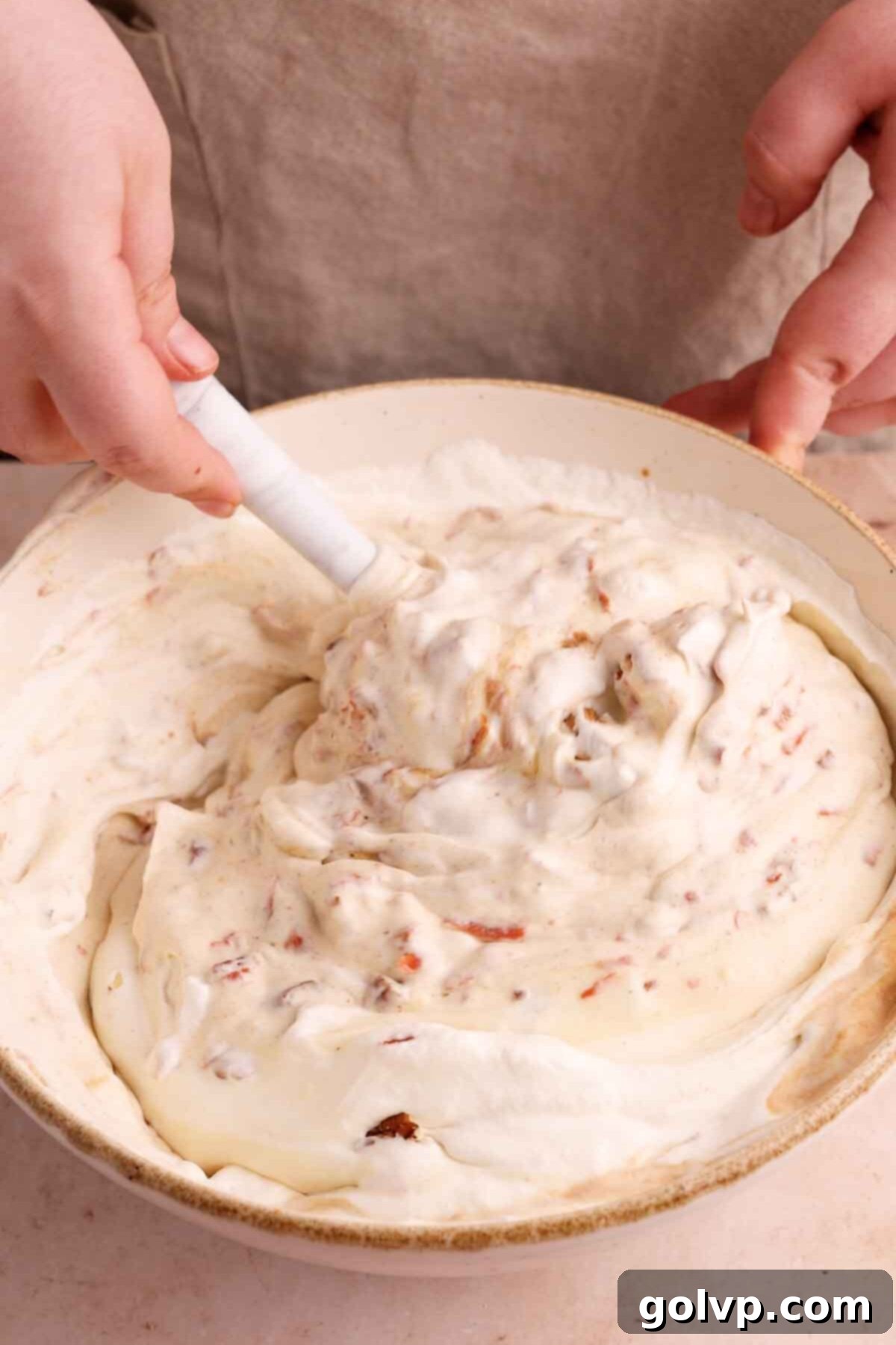 Spiced Carrot Cake Swirl 7 mixing the carrot cake ice cream base with mix-ins