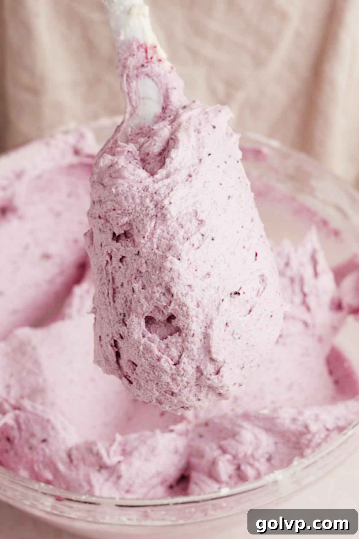 fluffy light texture of blueberry cream cheese frosting