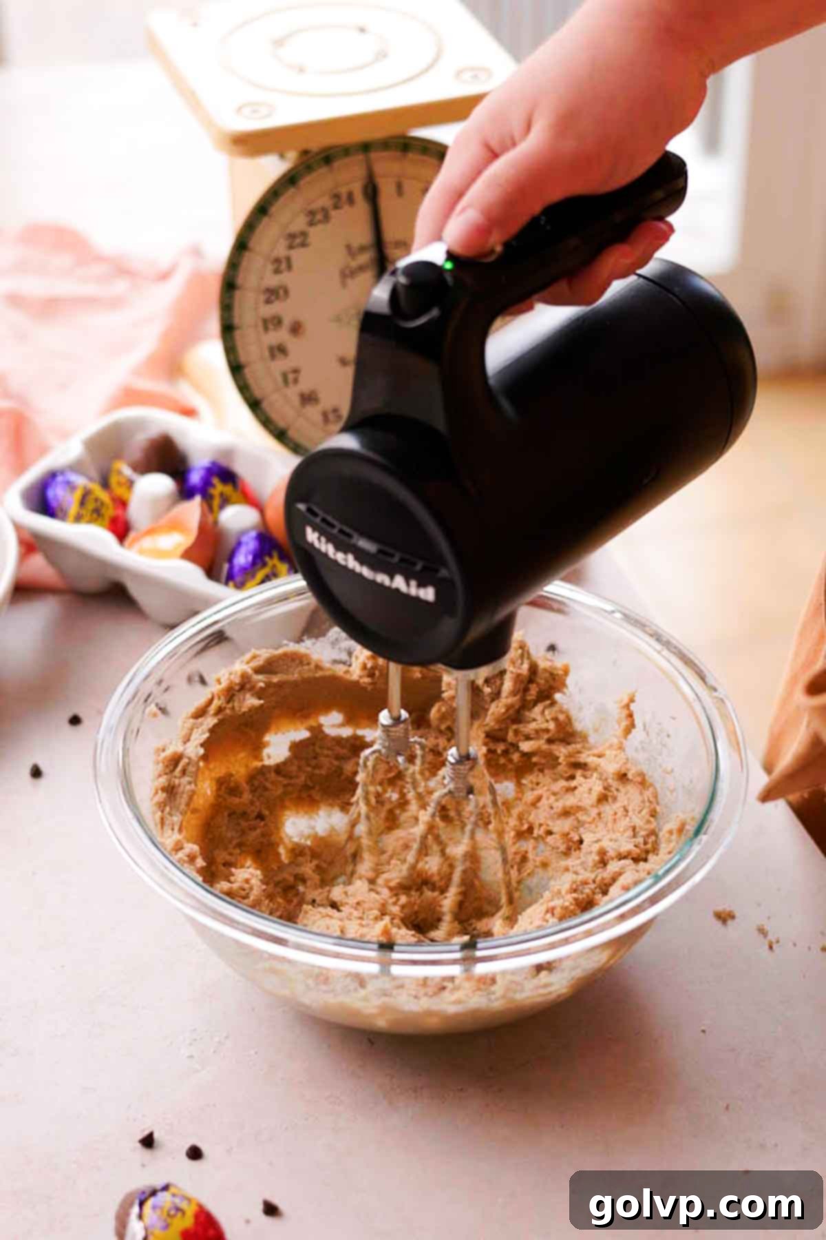 Creaming butter and sugar in a mixing bowl for cookie dough