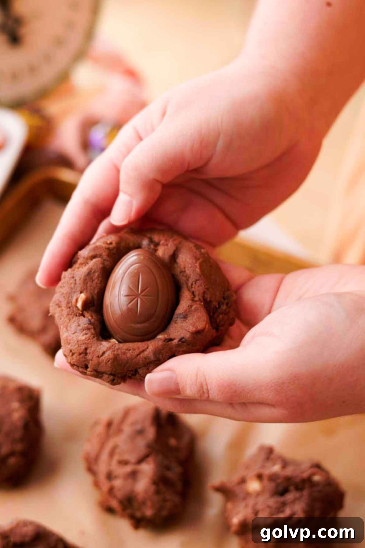 Stuffing cookie dough with unwrapped Cadbury chocolate creme eggs
