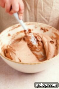 making milk chocolate cheesecake filling