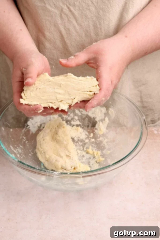 Chilled pop tart pastry dough wrapped in plastic wrap, ready for rolling