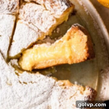 A beautiful slice of gooey lemon butter cake