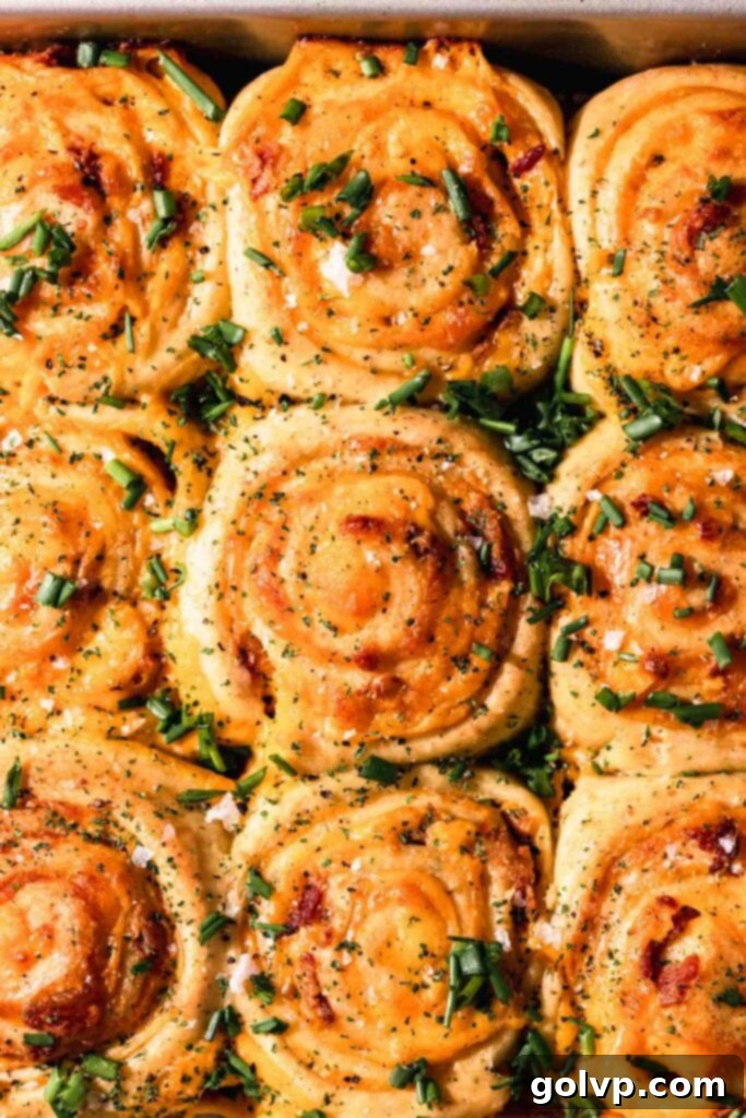 cheesy rolls sprinkled with chives, black pepper, and salt