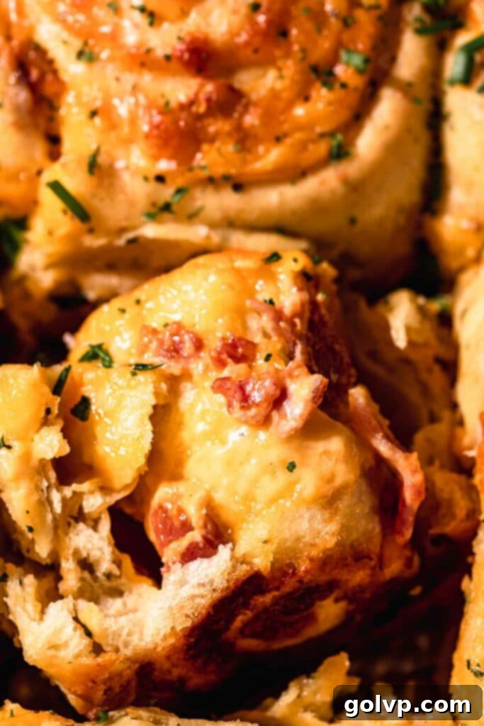 look inside a gooey cheese and bacon roll