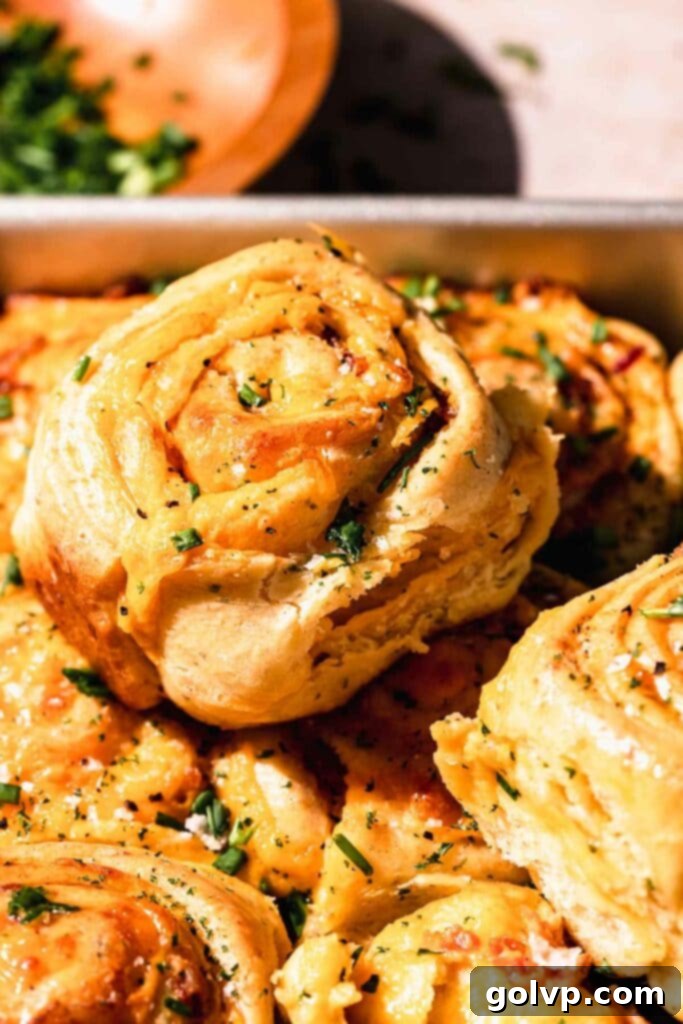 Rolls filled with bacon and cheddar sauce