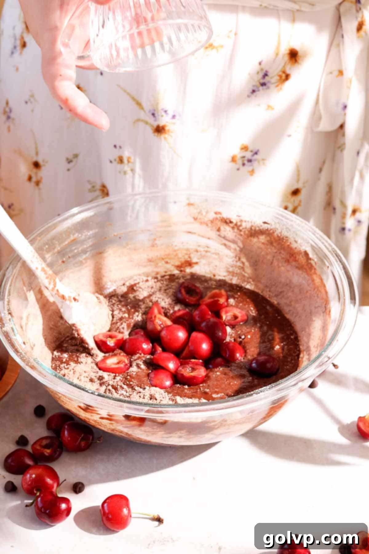Decadent Cherry Brownies 6 adding fresh cherries and chocolate chips to brownie batter