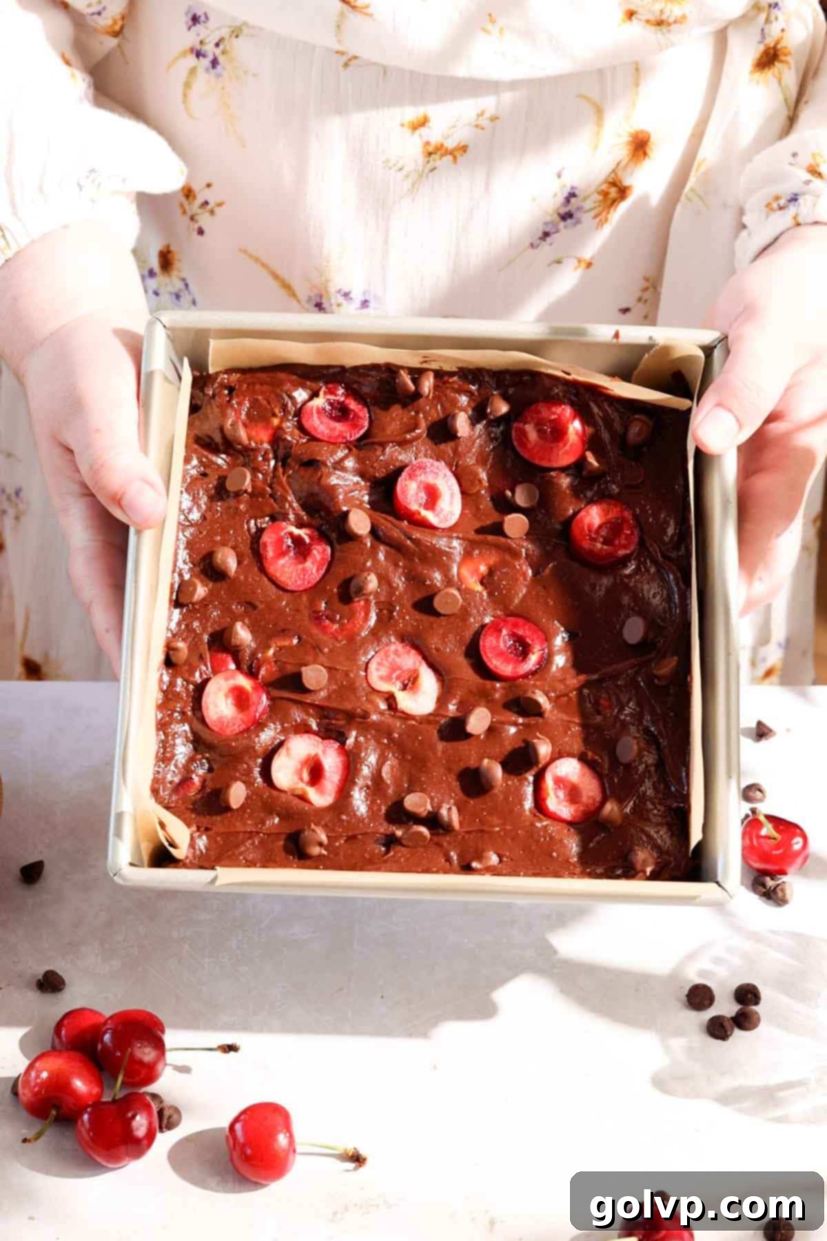 Decadent Cherry Brownies 7 cherry brownies ready to bake in a parchment lined square pan