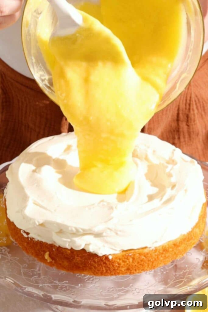 Zesty Lemon Victoria Sponge 11 filling cake with lemon curd