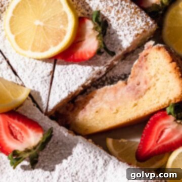Closeup of a slice of gooey strawberry lemon butter cake.