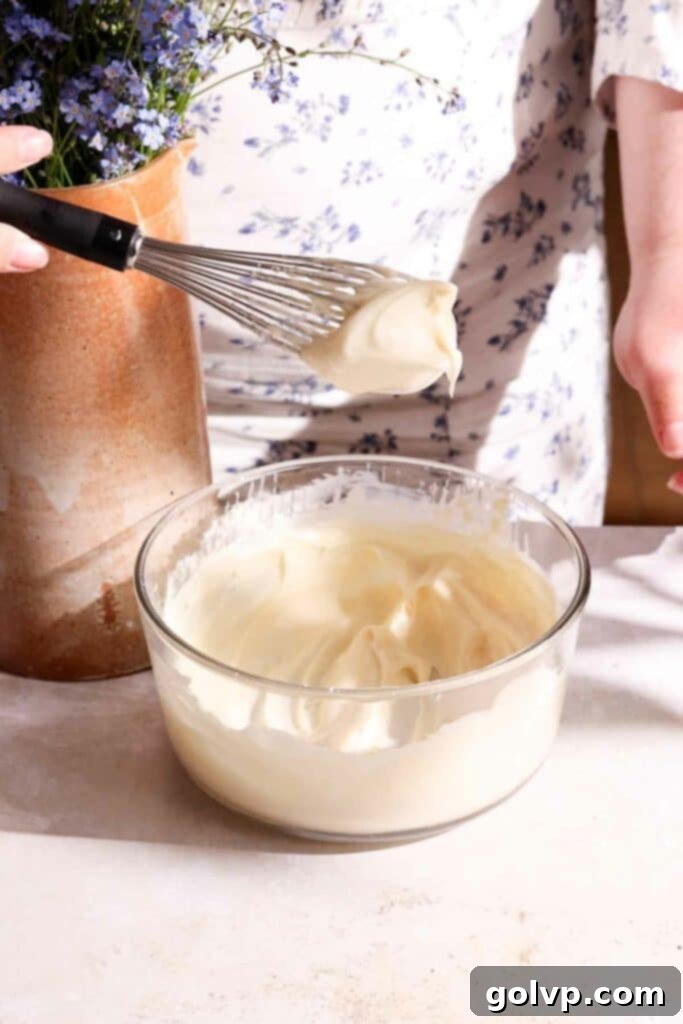 whisking cream cheese filling