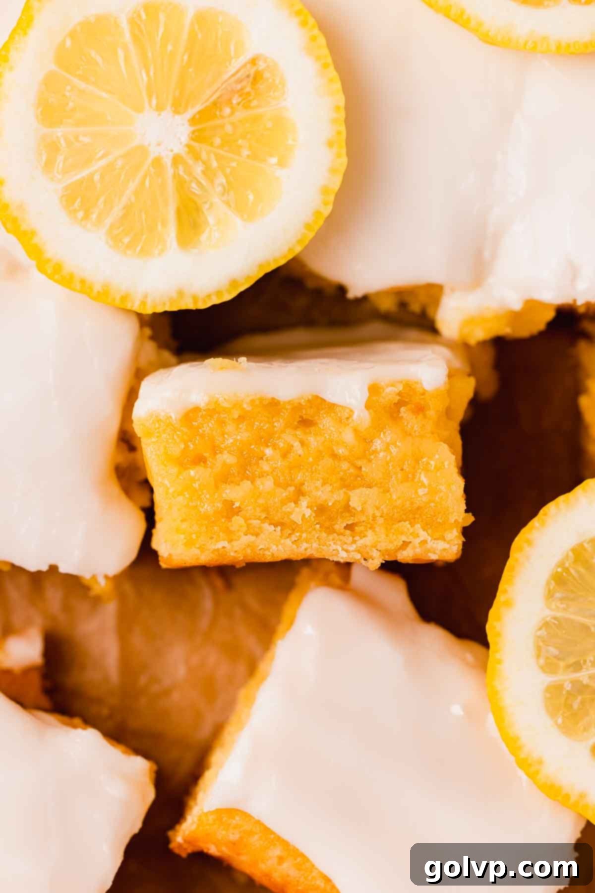 lemon brownies closeup of fudgy texture and lemon glaze
