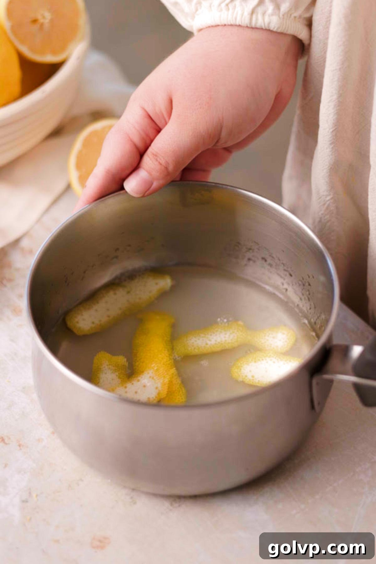 lemon syrup ingredients in small metal saucepan