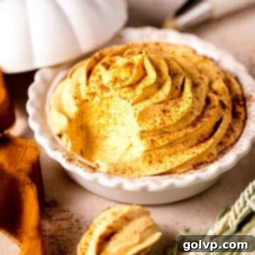 pumpkin whipped cream in mini pie plate with pumpkin spice