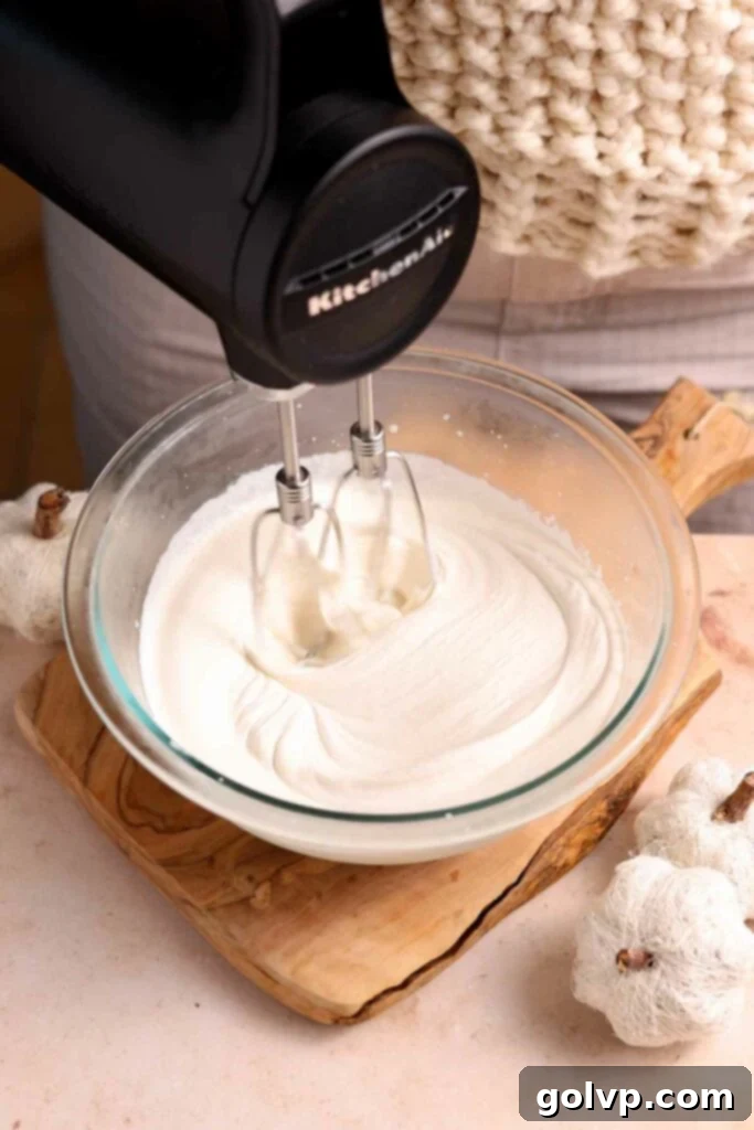 whip cream to medium peaks stage