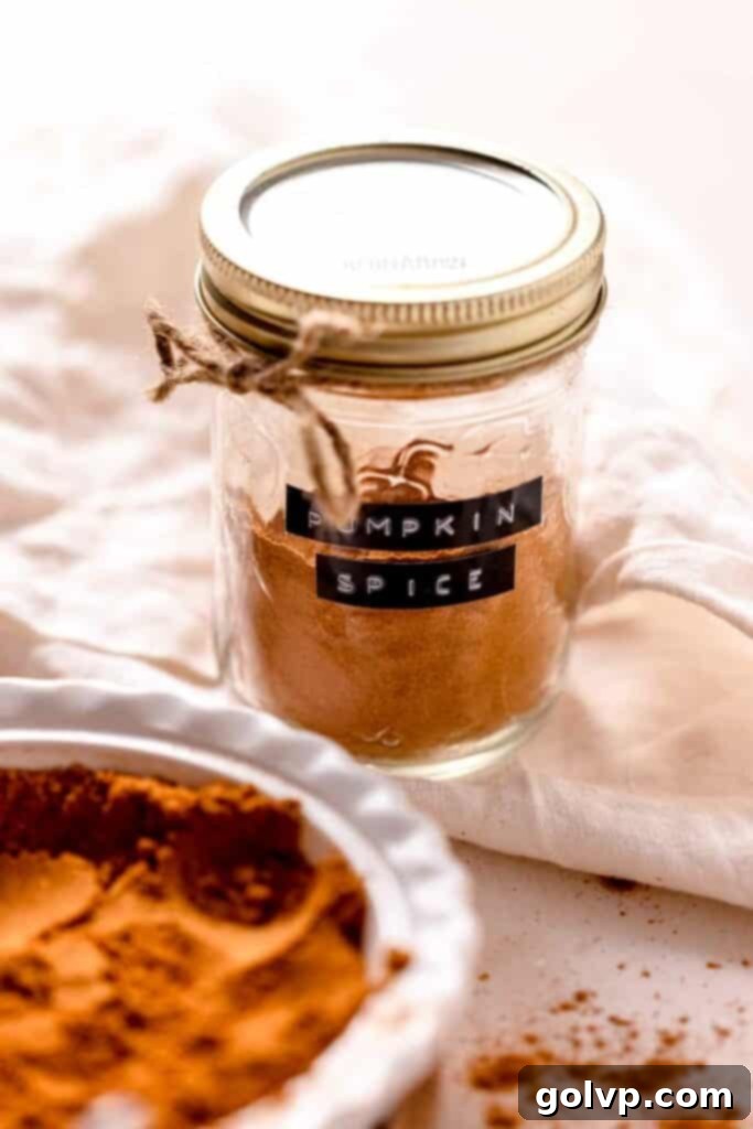 Pumpkin spice mix in glass jar with lid and twine