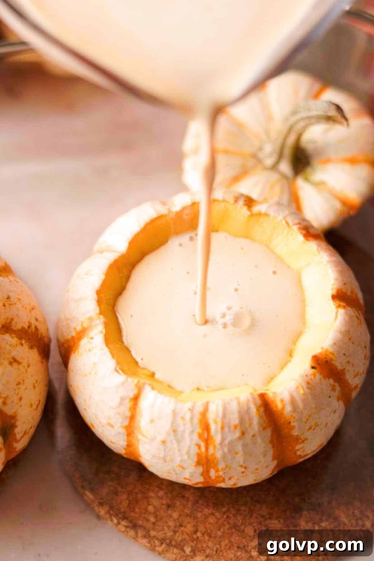 pour creme brulee into pumpkins